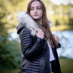 Larissa's Black Leather Jacket with Hoodie and Fur Trim - Image 3